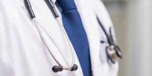 Doctor with stethoscope, representing medical decisions under advance directives