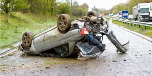 Car accident on a Colorado road with visible vehicle damage