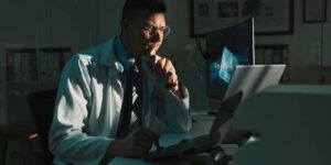 Man reviewing digital assets and online accounts on futuristic displays