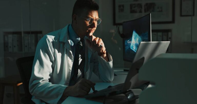 Man reviewing digital assets and online accounts on futuristic displays