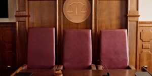 Empty courtroom judge bench where guardianship petitions are heard