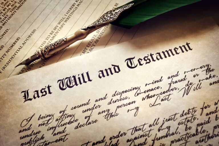 Last will and testament document with a quill pen