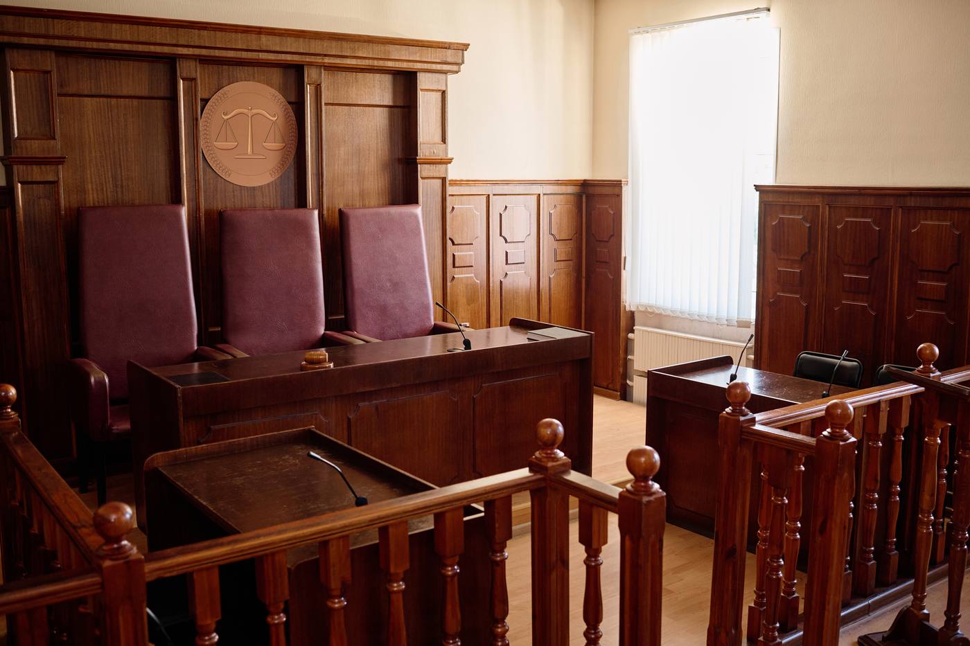 Empty Colorado courtroom interior with wooden furniture