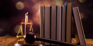 Gavel, legal code, and scales of justice representing the Colorado probate process