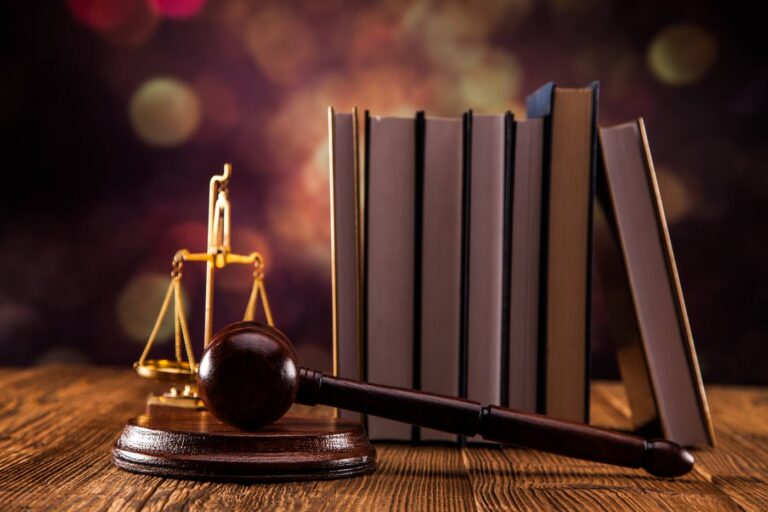 Gavel, legal code, and scales of justice representing the Colorado probate process