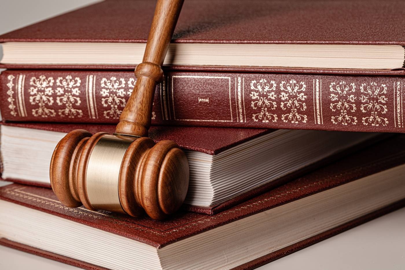 Judge gavel and legal book on a probate court table