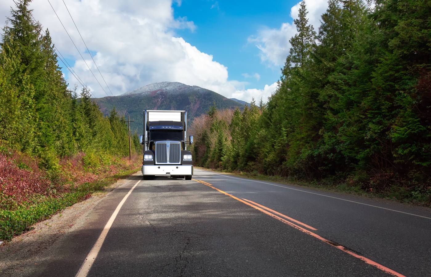 Commercial semi truck on a Colorado mountain road