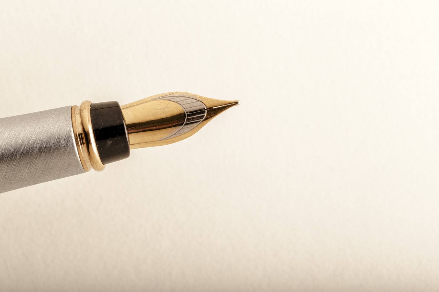 Handshake over a contract on a conference table